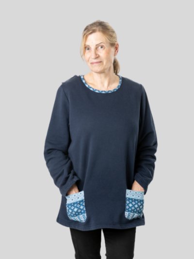 Taskullinen edestä puettava pusero